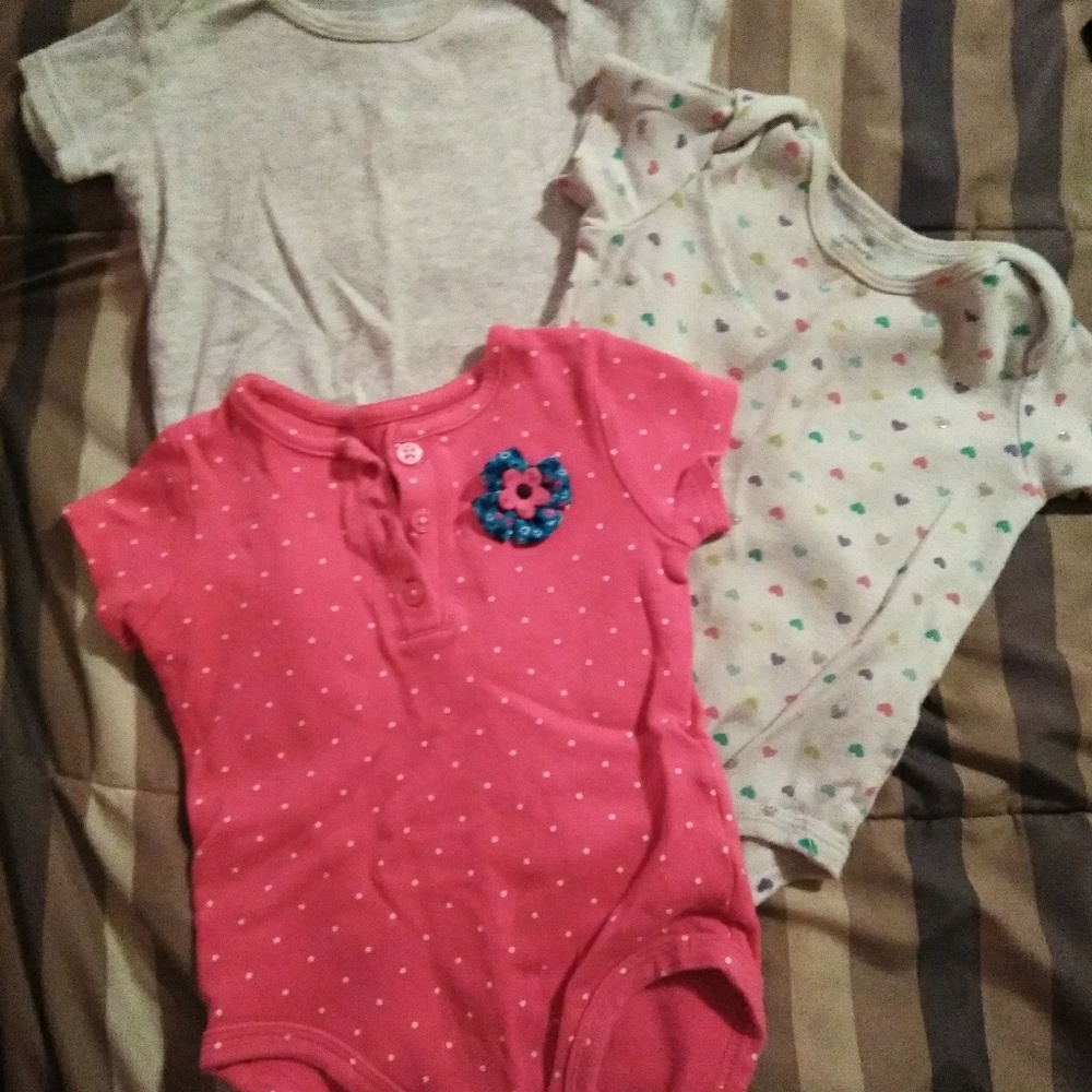 Three Carter onesies